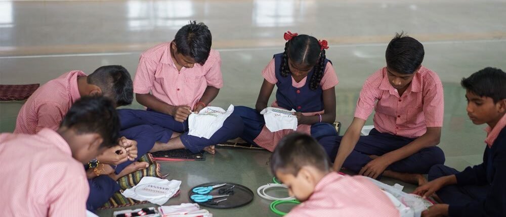 Children-learn-how-to-stitc